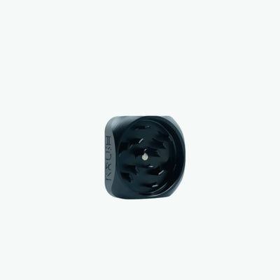 Black Krush premium coffee grinder with stainless steel grinding chamber and ergonomic handle, ideal for fresh coffee grounds.